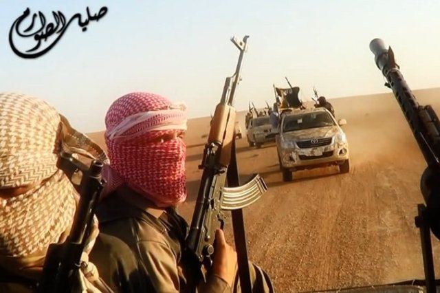 An image taken from a video uploaded on Sunday by the Islamic State of Iraq and Syria claiming to show fighters in Tikrit, Iraq. (Credit ISIS, via Agence France-Presse — Getty Images)